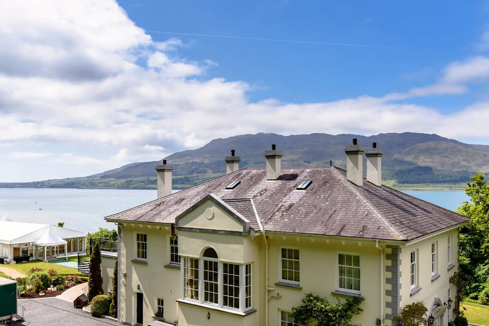 Montalto House, Zoe Flood & Keith Moloney, Montalto House Wedding, private house in the countryside next to the sea with marky set up in the front lawn for wedding celebrations the next day