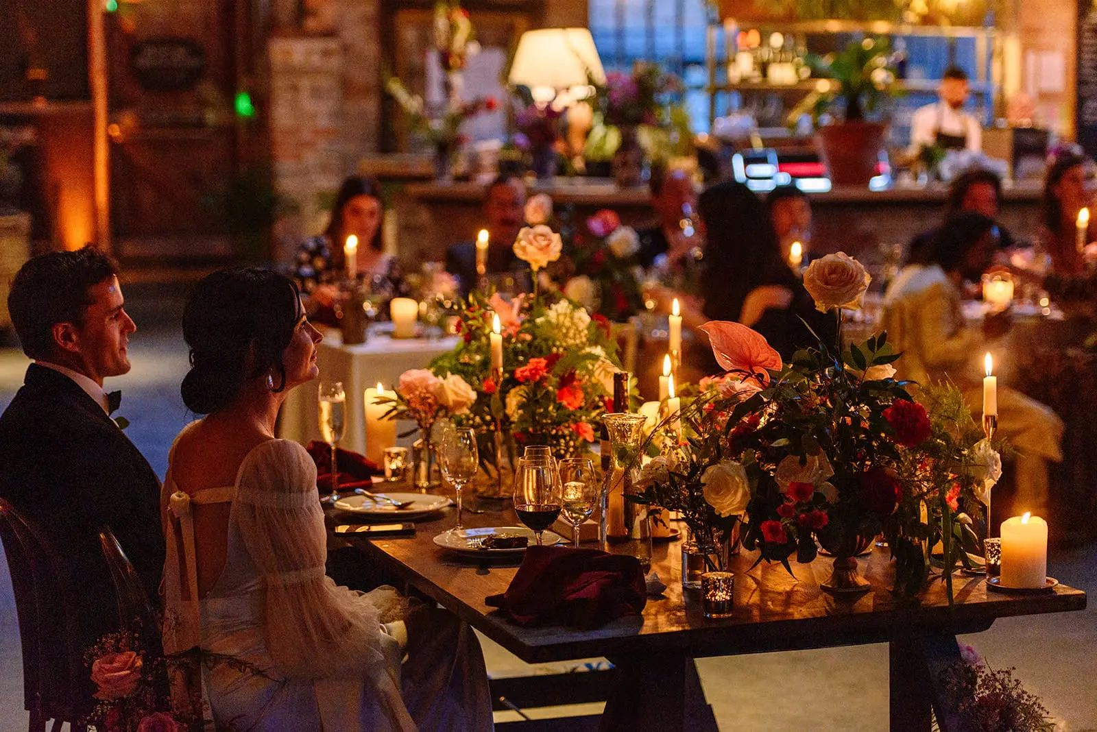 bridal couple sitting at dining table at kilruddery house wedding