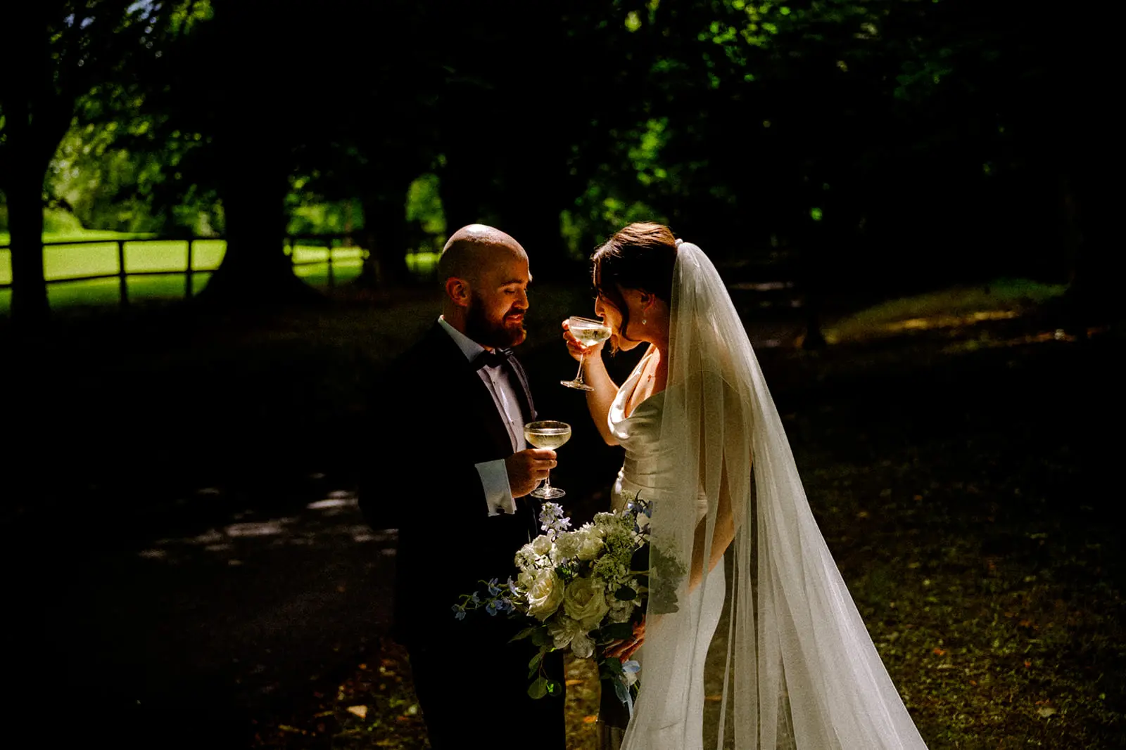Bride and groom outside during Waterford Castle wedding in March