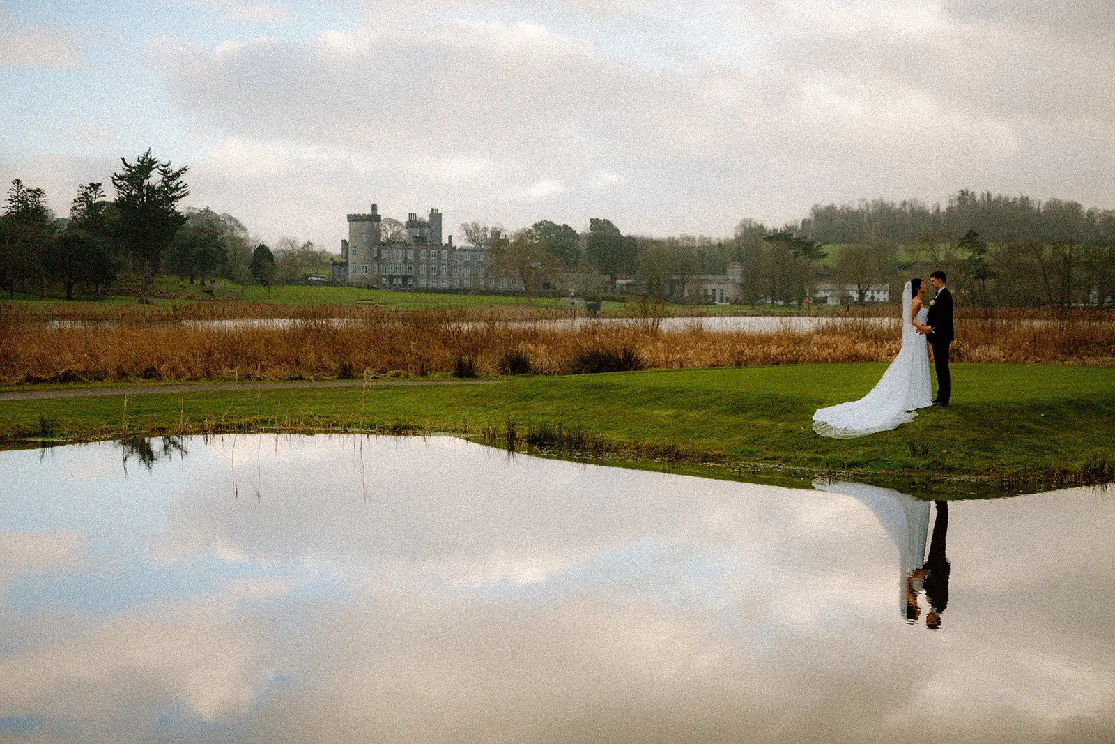 Ava and Conor by the lake during their Dromoland Castle wedding